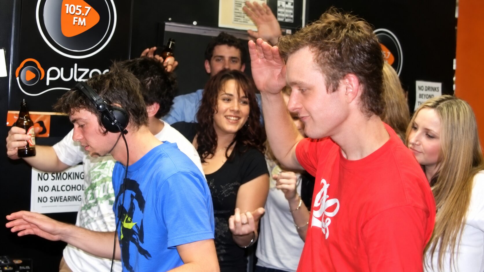 A Friday and Saturday night party inside the PulzarFM studio during a live dance music broadcast in Christchurch.